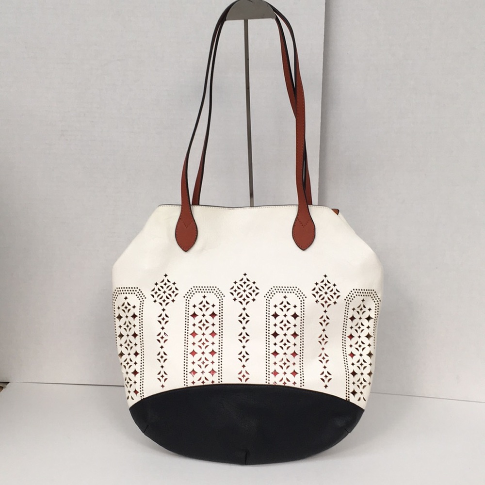 Liz Soto Handbags 2 in 1 tote in cut out design.